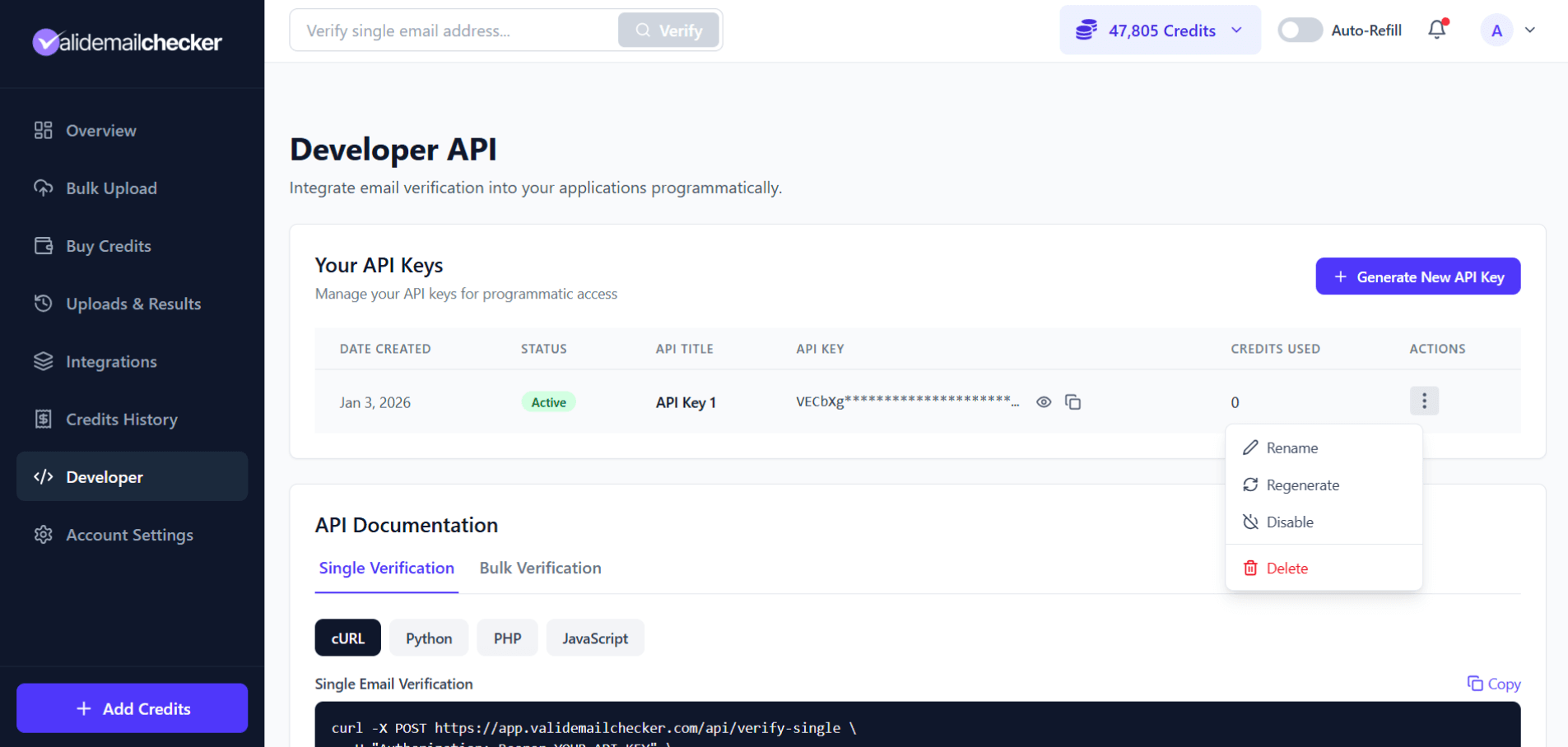 API keys table showing date created, status, title, masked key, credits used, and an action menu per row