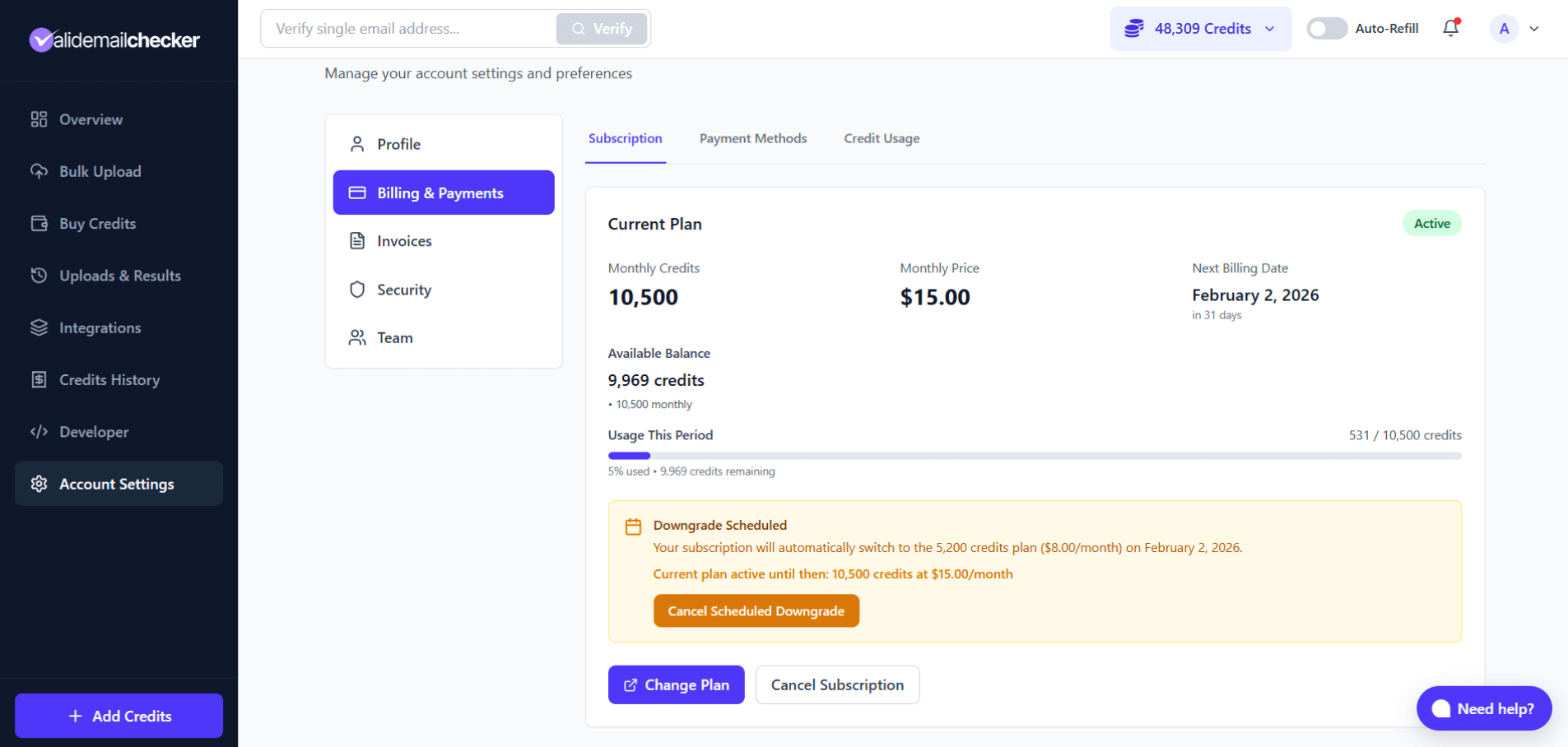Subscription page showing a yellow banner that the plan is scheduled to downgrade on a specific date, with a Cancel Scheduled Downgrade button